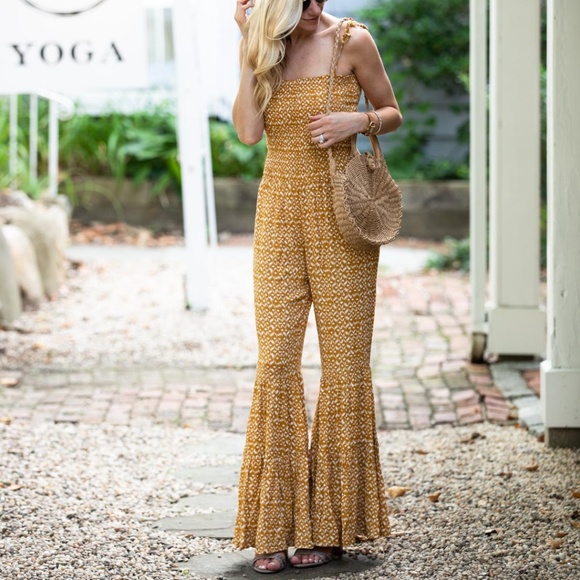 orange bell bottom jumpsuit